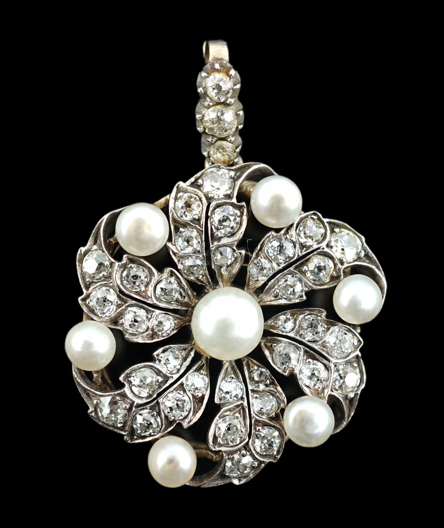 A Victorian gold, button pearl and diamond cluster set pendant, with three stone diamond set bale